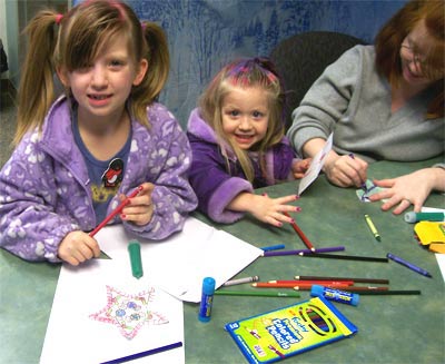 Young children making crafts